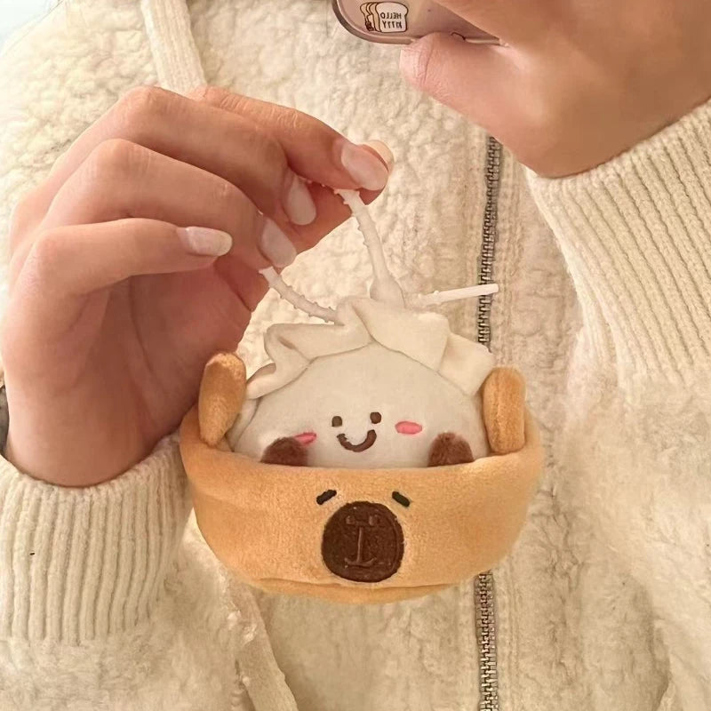 Capybara plush keychain 7cm size comparison next to coin for scale