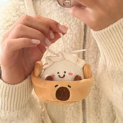 Capybara plush keychain 7cm size comparison next to coin for scale