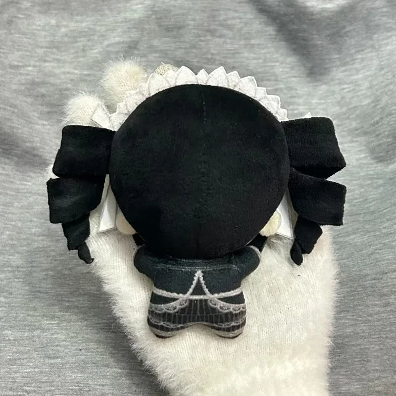 Celestia Ludenberg plush 10cm size held in hand for scale
