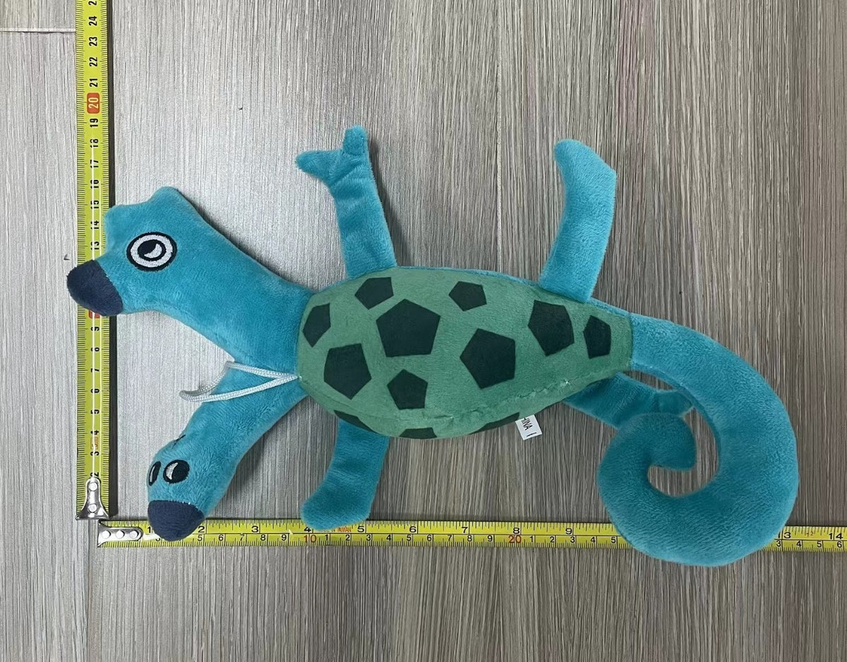 Chameleon turtle hybrid plush side view coiled tail visible