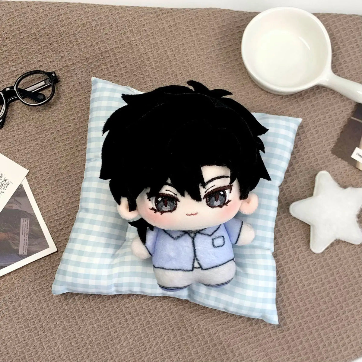 Cheng Xiaoshi and Lu Guang handmade anime plushies displayed for size reference