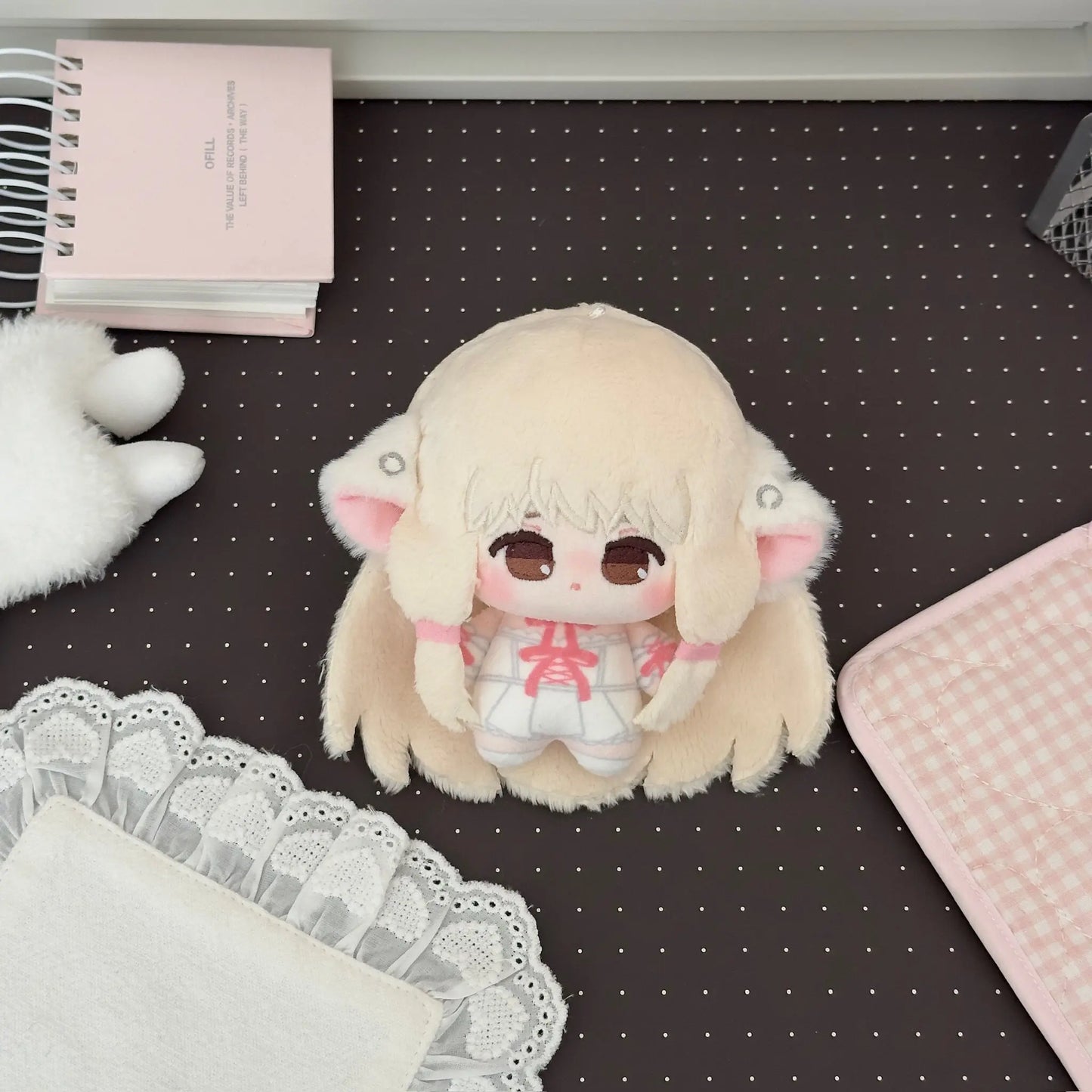 Chi plush size reference showing 10cm height against ruler