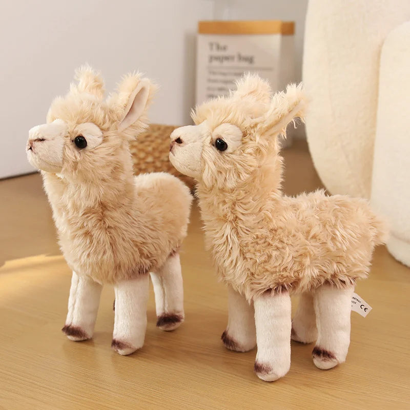 Child holding alpaca plush toy showing huggable 30cm size

