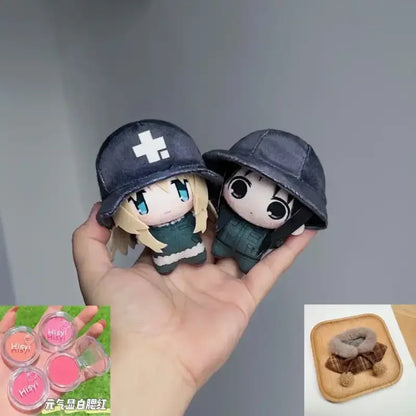 Chito and Yuuri plush figures displayed together on a wooden shelf
