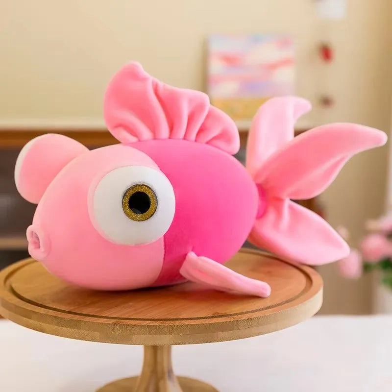 Chonky goldfish plush trio in yellow, red, and pink color variants