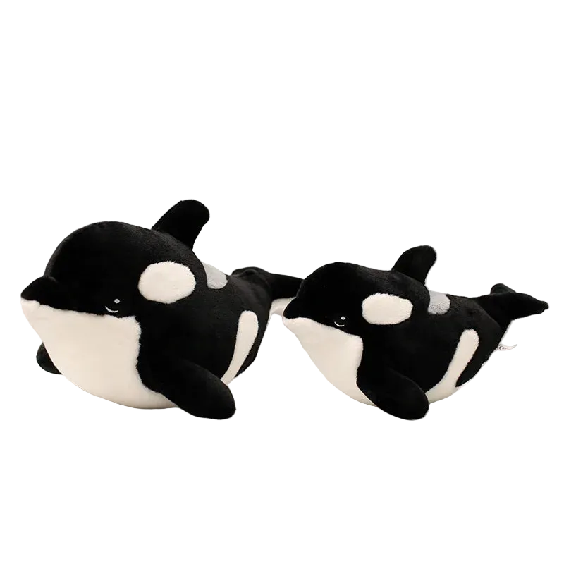 Chonky orca plushie in 30cm size lying flat on white background