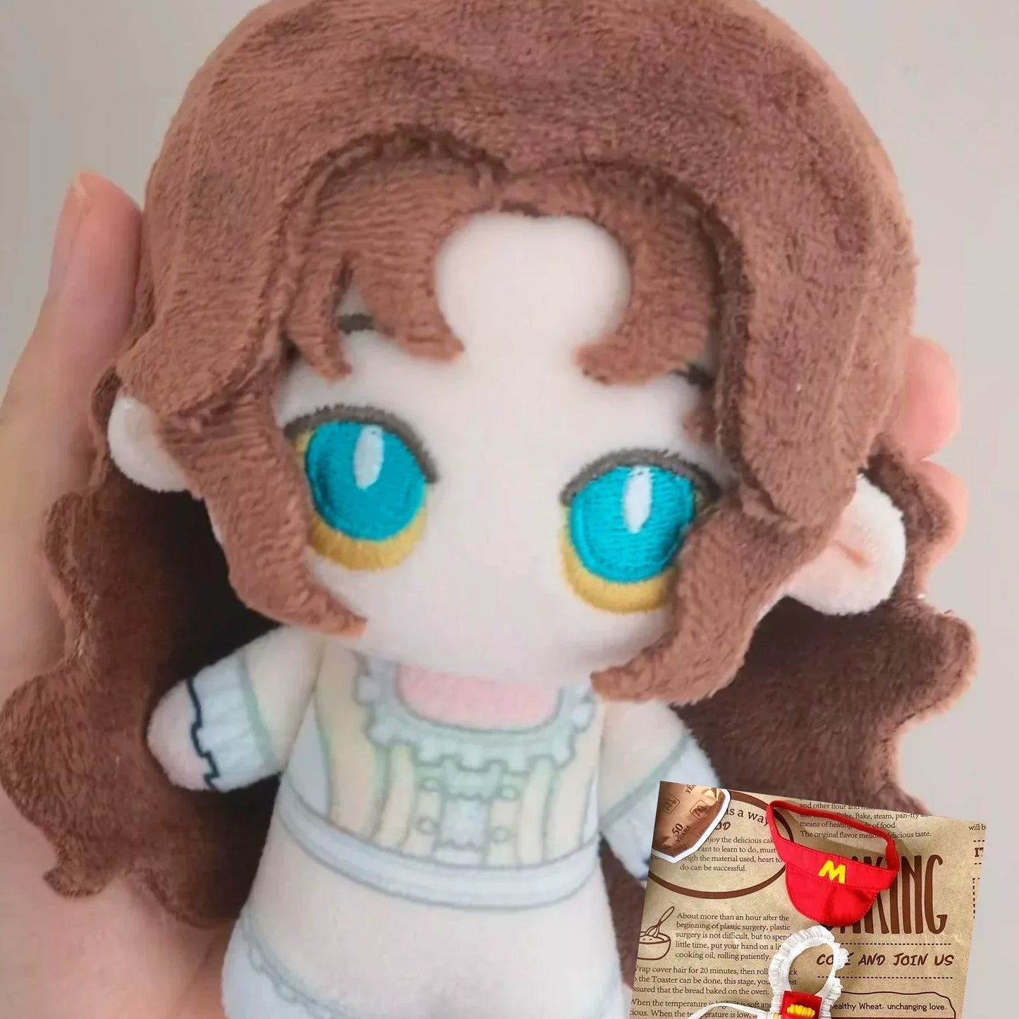 Christine Daae plush close-up face detail soft short plush fabric
