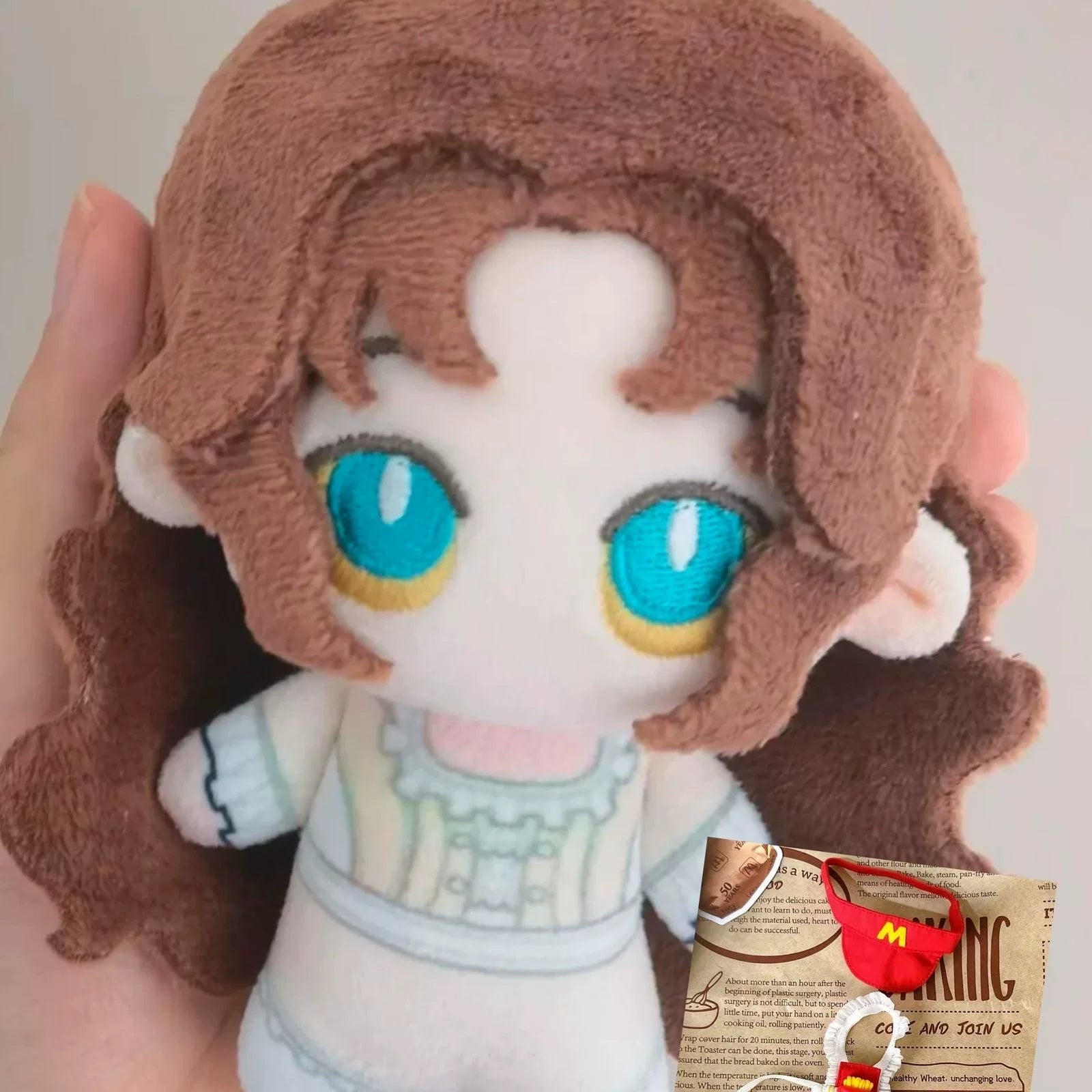 Christine Daae plush close-up face detail soft short plush fabric
