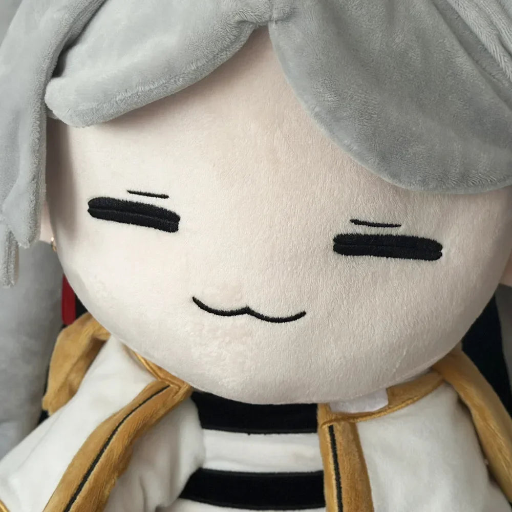 Close-up of Frieren plush face and elven ears