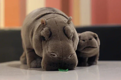 Close-up of Moo Deng plushie face detail showing soft plush fabric texture and adorable expression
