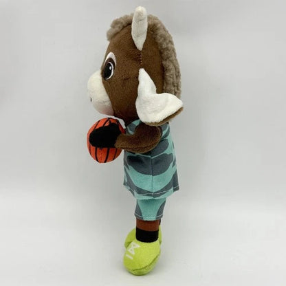 Close-up of Will Harris plush face and upper body, smalls can ball plush, brown black and white character design
