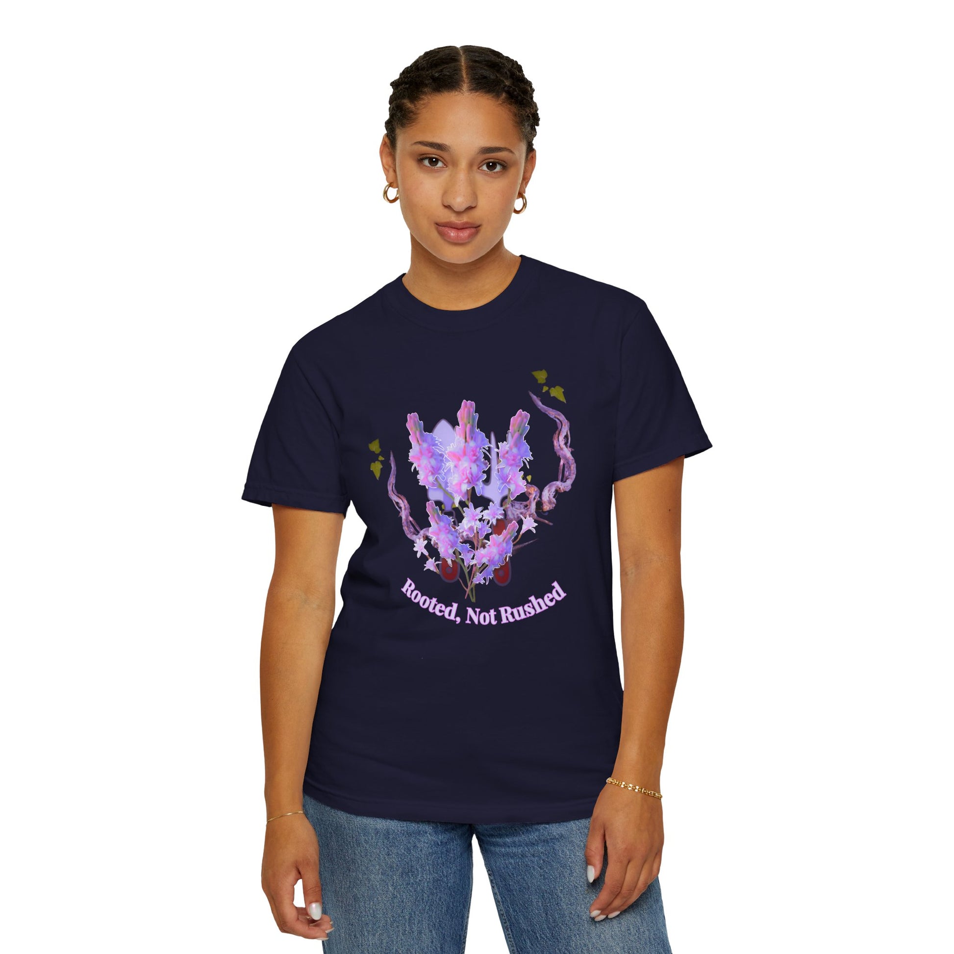 Close-up of arched rooted not rootless lettering on lavender floral graphic tee