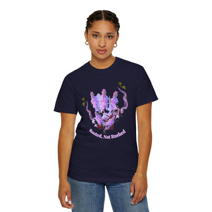 Close-up of arched rooted not rootless lettering on lavender floral graphic tee