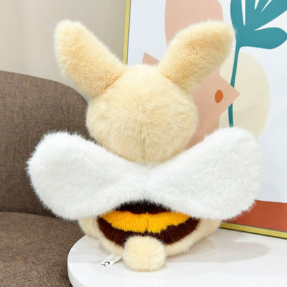 Close-up of embroidered face on bumblebee bunny plush