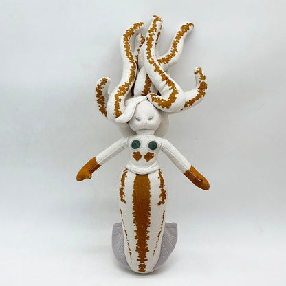 Close-up of handmade mermaid stuffed toy tentacle hair details