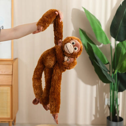 Close-up of hook-and-loop fastener hands on hanging monkey plushie