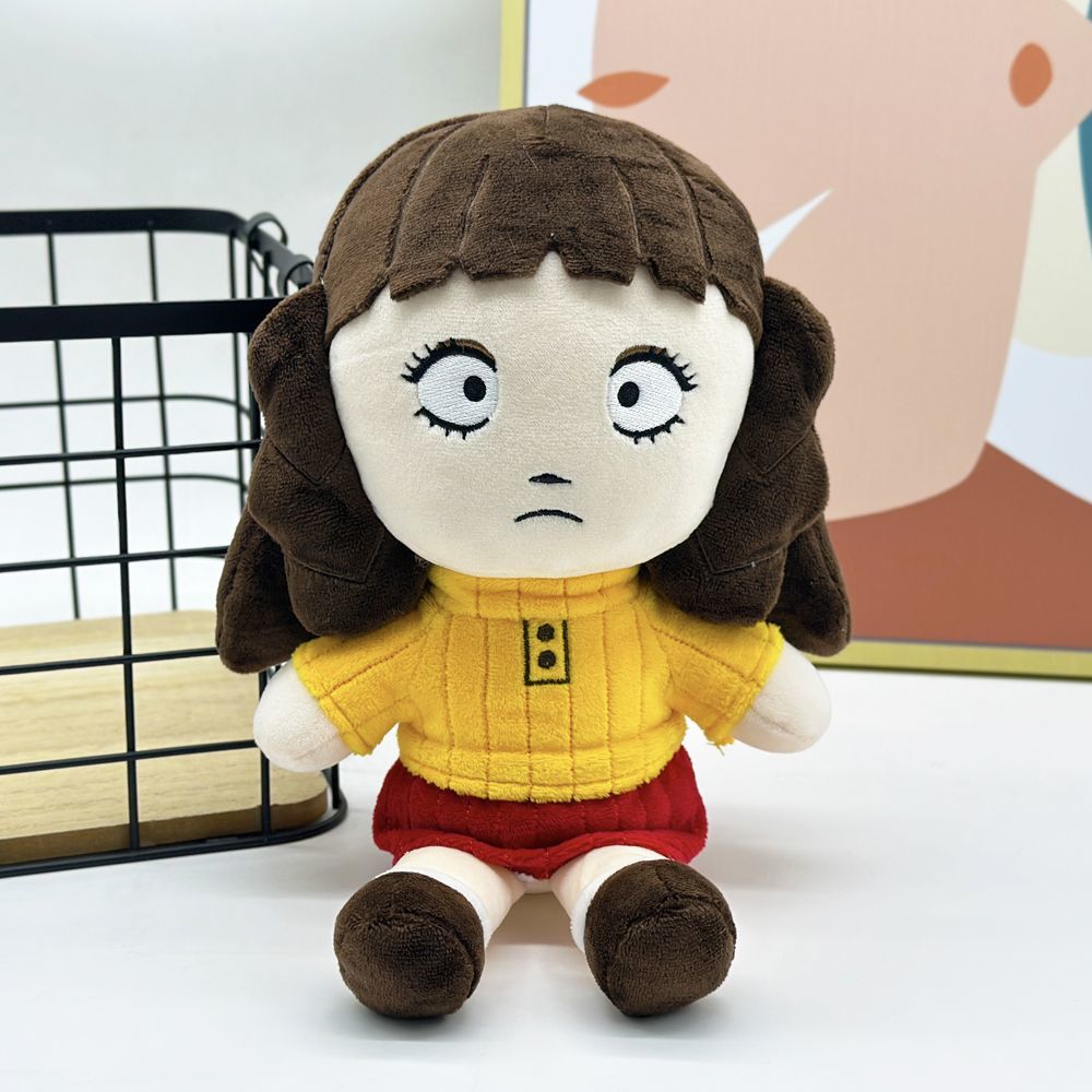 Close-up of rosemary plushie face detail handmade stitching quality