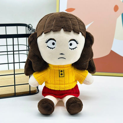 Close-up of rosemary plushie face detail handmade stitching quality