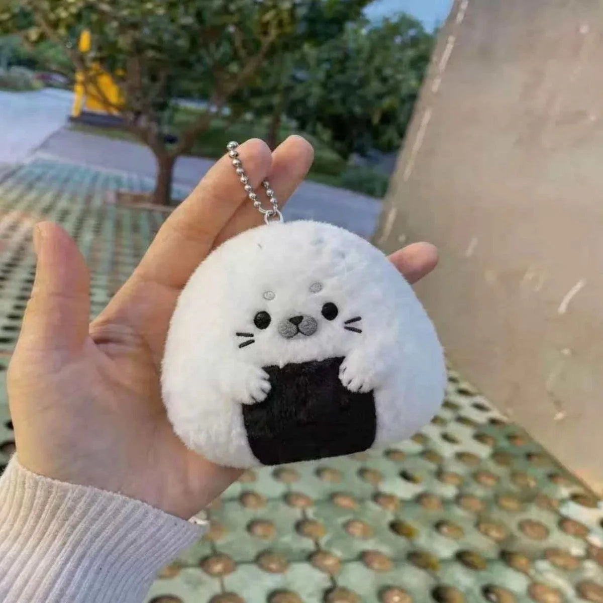 Close-up of seal face detail on Japanese food plushie keychain