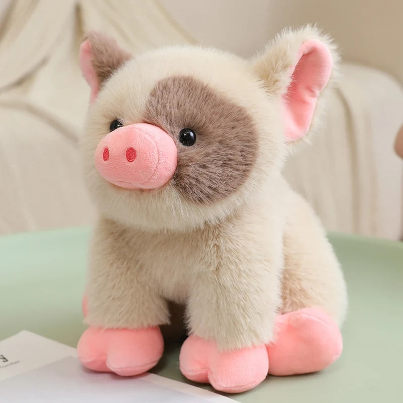 Close-up of spotted piglet plush face showing stitched features and plump snout, kawaii pig toy