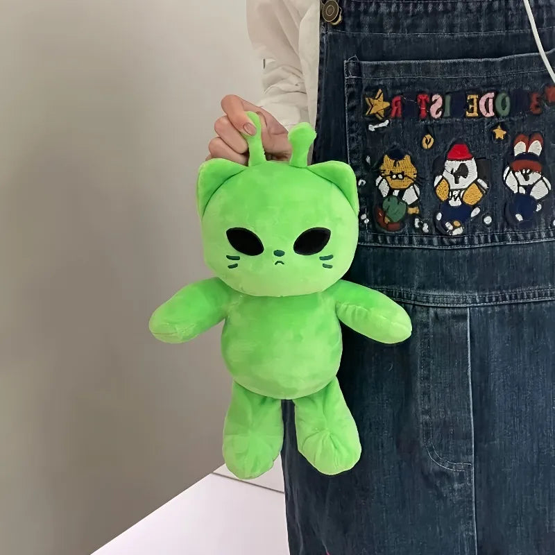 Close-up of the high-quality stitching on the alien cat plush
