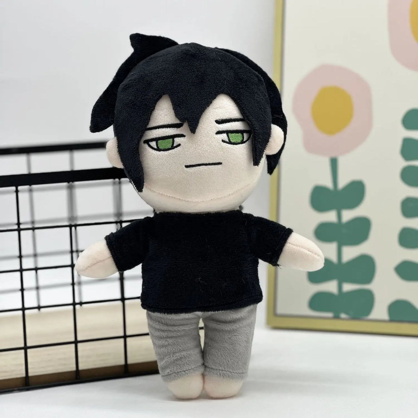 Close up of Andy Graves plush face and calm expression
