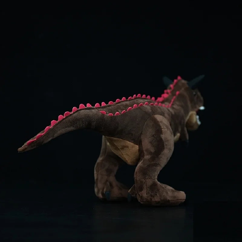 Close up of Carnotaurus plush head showing horn texture and premium plush fabric quality