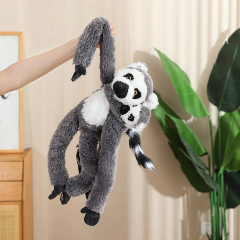 Close up of chimpanzee plushie face showing detailed craftsmanship and soft cotton material