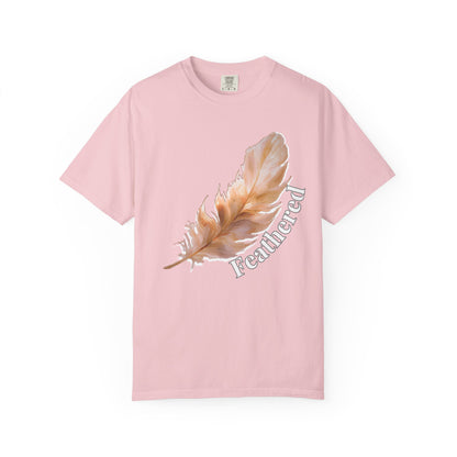 Close up of feathered printed tees artwork showing soft toned feather illustration