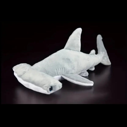 Close up polyester fabric texture of hammerhead shark stuffed plushie