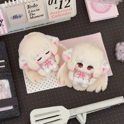 Collectible anime figure Chi plush grouped on fan display shelf