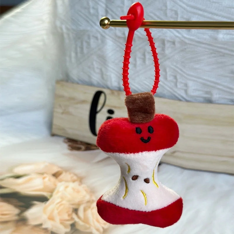 Cottagecore keychain apple core doll on a set of car keys