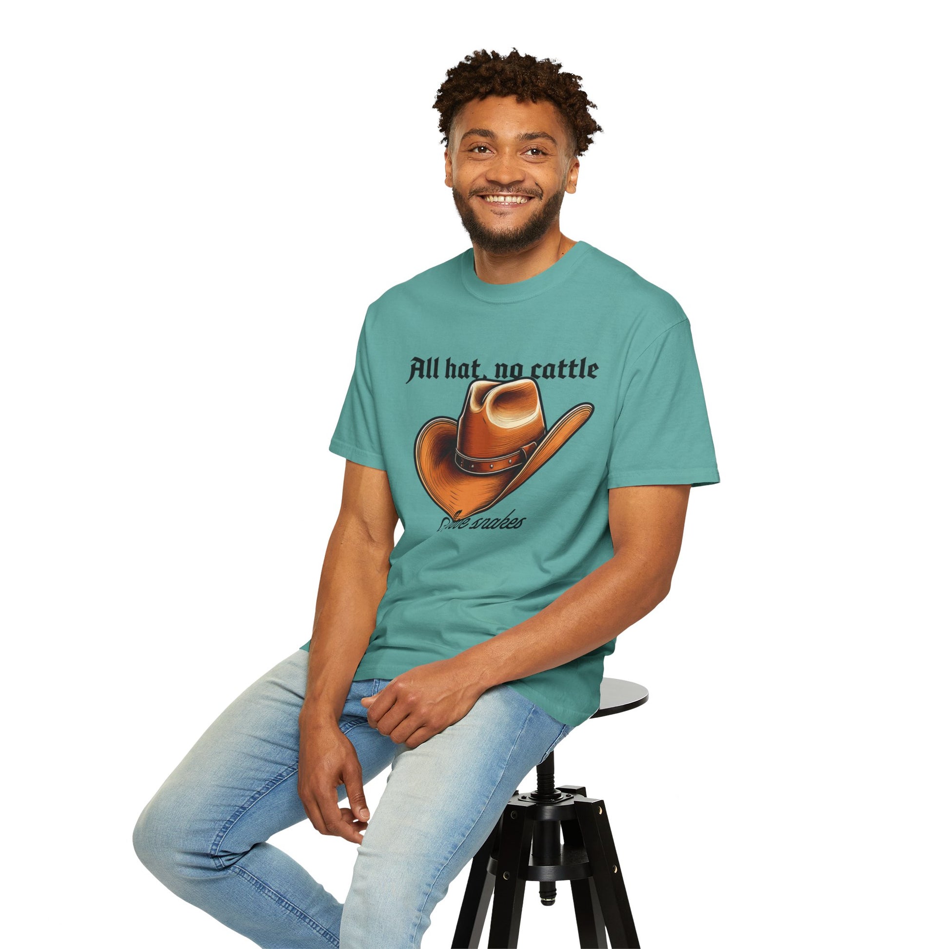 Cowboy graphic tee paired with rolled cuff jeans and sneakers
