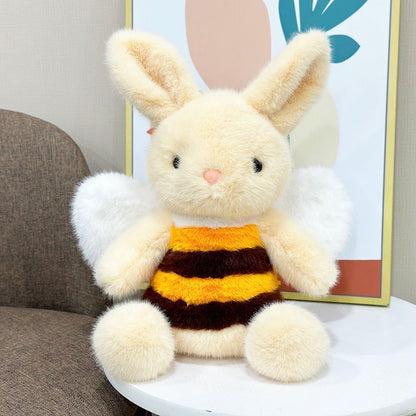 Cute bee plushie with striped yellow and black body and organza wings