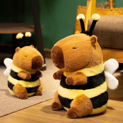 Cute capybara stuffed animal dressed in bee costume, front view, showing full bumblebee outfit with antennae detail