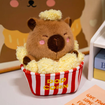 Cute capybara toy desk companion plush sitting on keyboard