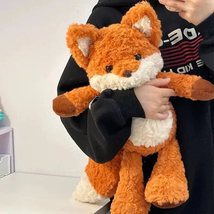 Cute handmade fox stuffed animal with fluffy tail detail