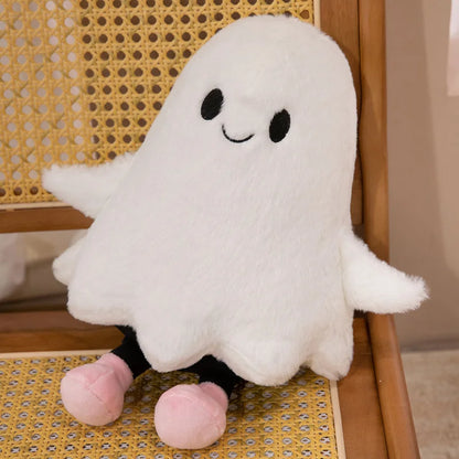Cute little ghost plushie styled in an autumn room decor setup