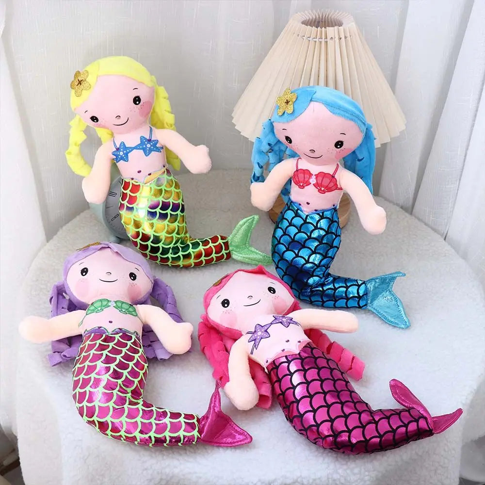 Cute mermaid plush ragdoll displayed upright showing full body and glitter tail