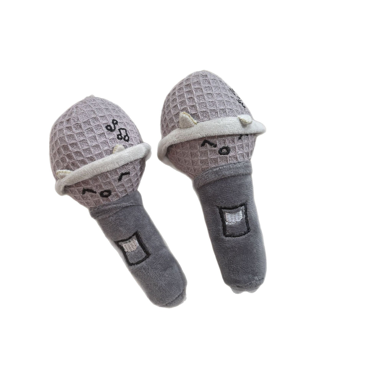Cute mic plush keychain with waffle weave grille head and embroidered musical notes on white background