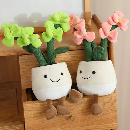 Cute orchid plushie sitting on white background full view