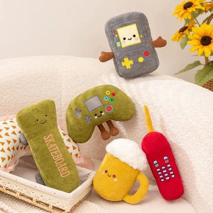 Cute retro gamer plushies collection featuring game console, controller, phone, beer and skateboard