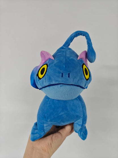 Cute sea monster plush with friendly expression and sculpted arms, 25cm mythical sea creature plushie