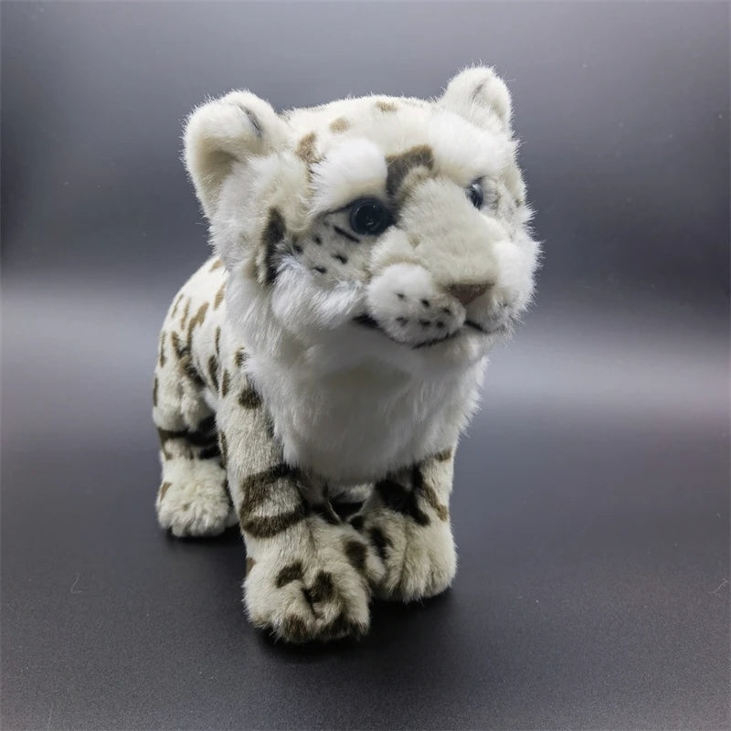 Cute snow leopard toy close up expressive face