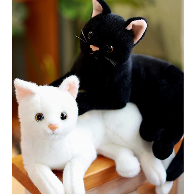 Cute white British Shorthair cat plushie with soft plush texture close up