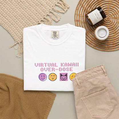Cyber kawaii graphic tee styled in a Y2K flat lay with handheld console and accessories
