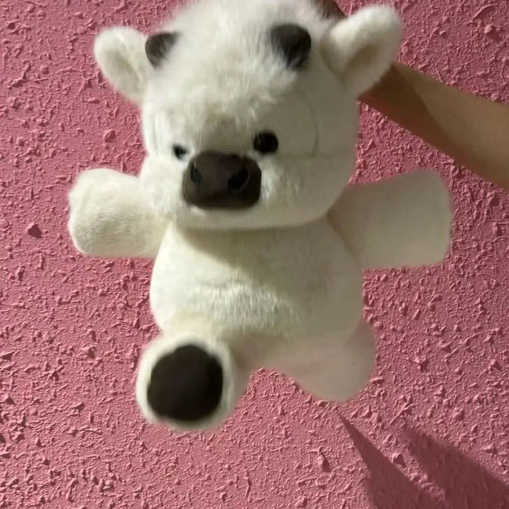 Decorative-cow-plushie-on-bedroom-shelf