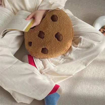 Decorative food pillow cookie plush on a minimalist desk with plant decor