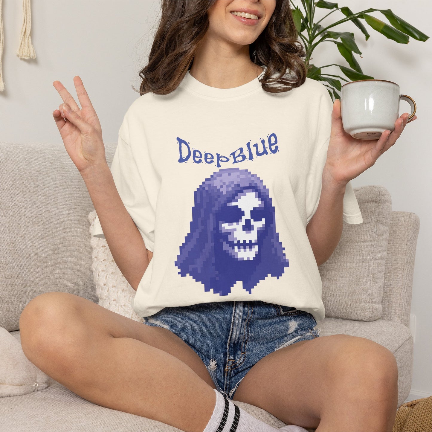 Deep Blue graphic tee worn by male model in dark urban streetwear setting
