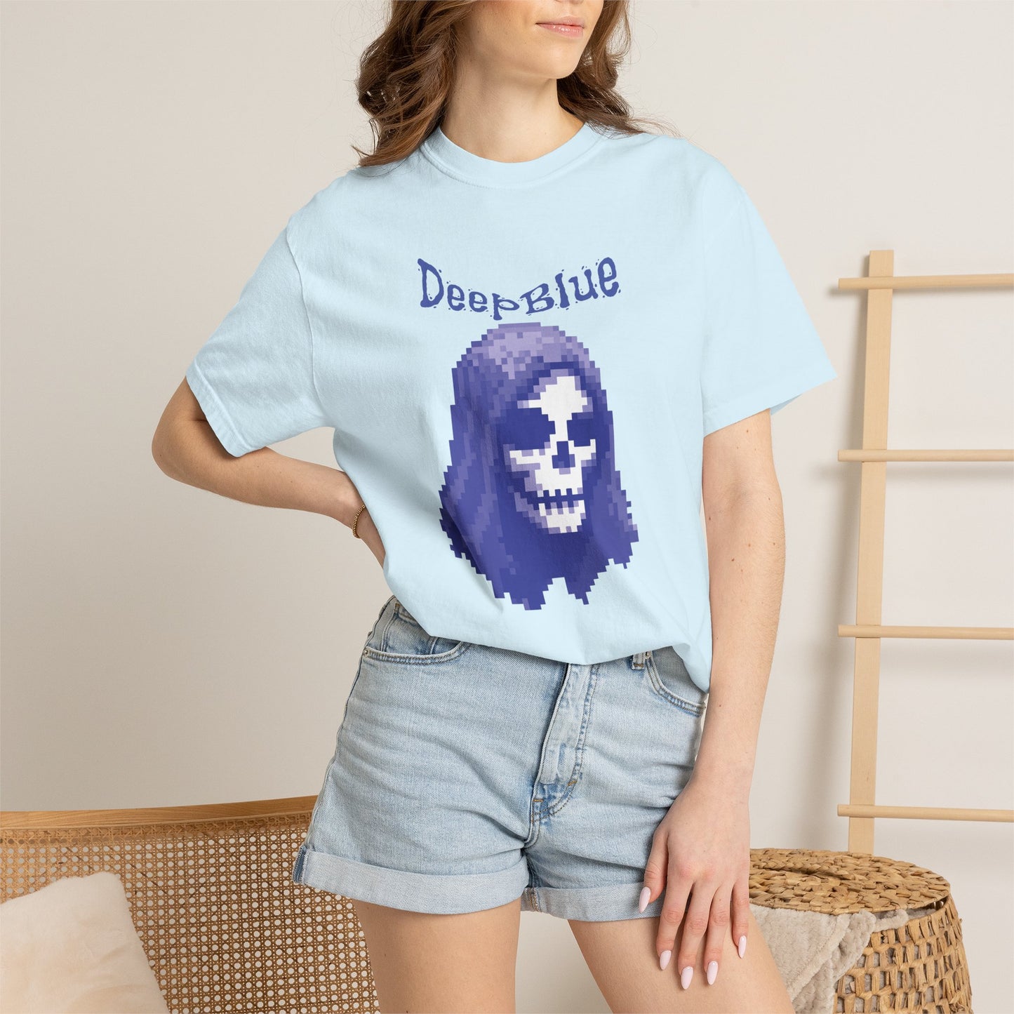 Deep Blue pirate graphic shirt hanging outdoors in coastal environment
